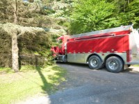 Firemen from Coudersport and Roulette responded to a fire in North Coudersport on Friday.
